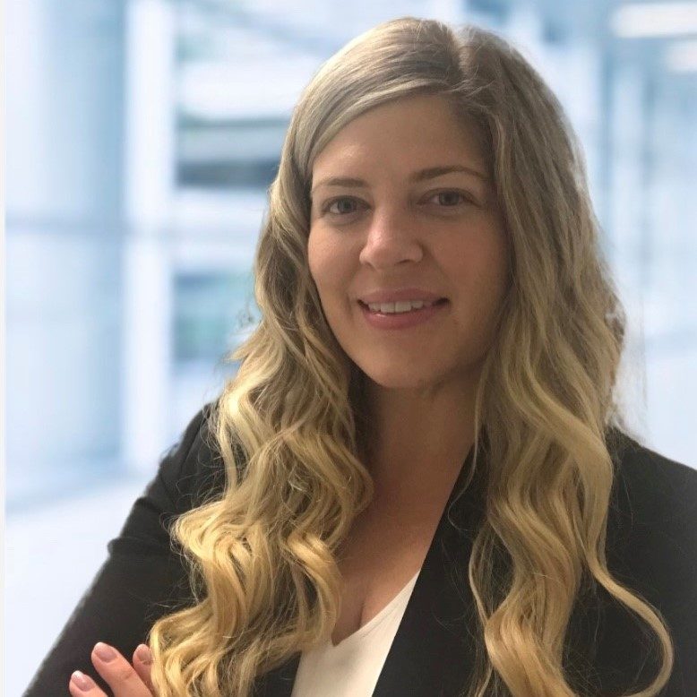 Cali Schmitt portrait: Professional headshot of Cali Schmitt, attorney at DeMayo Law, posed against a neutral background.