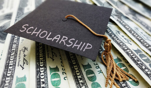 Scholarship,Graduation,Cap,On,Money